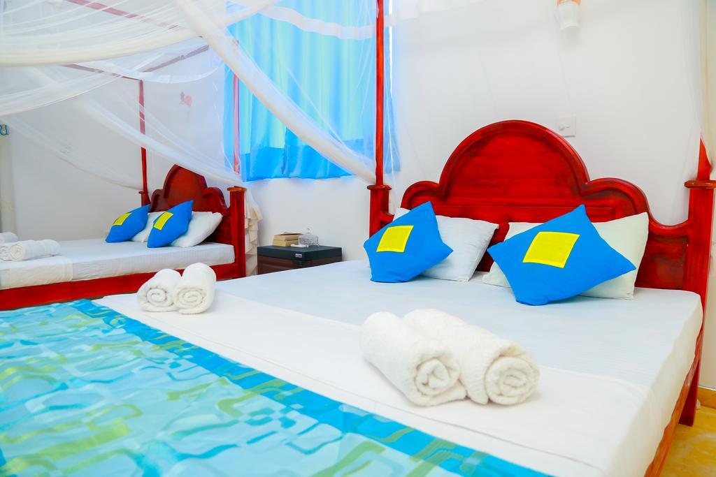 Autumn Moon Beach Cabanas Тангале Екстериор снимка